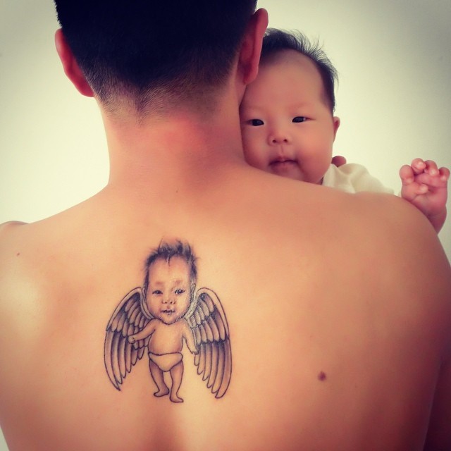 Tatuagem nas costas para homem: Para homenagear os filhos
