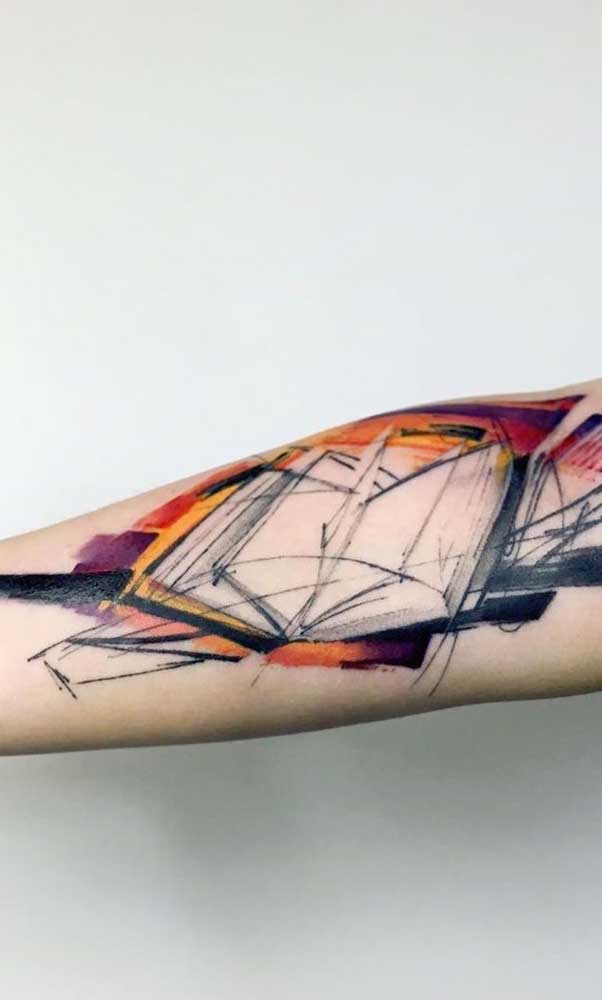 Outro modelo de tatuagem livros aquarela só que com o livro aberto.