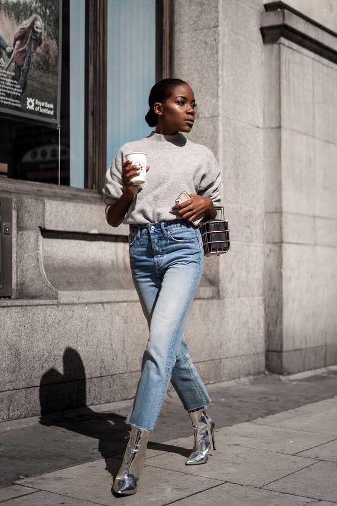 A bota de cano longo é uma grande amiga da calça jeans