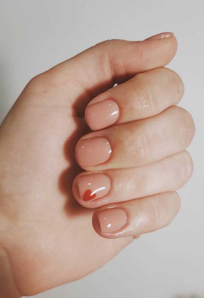 Filha única para os corações românticos neste exemplo de unhas delicadas rosa.