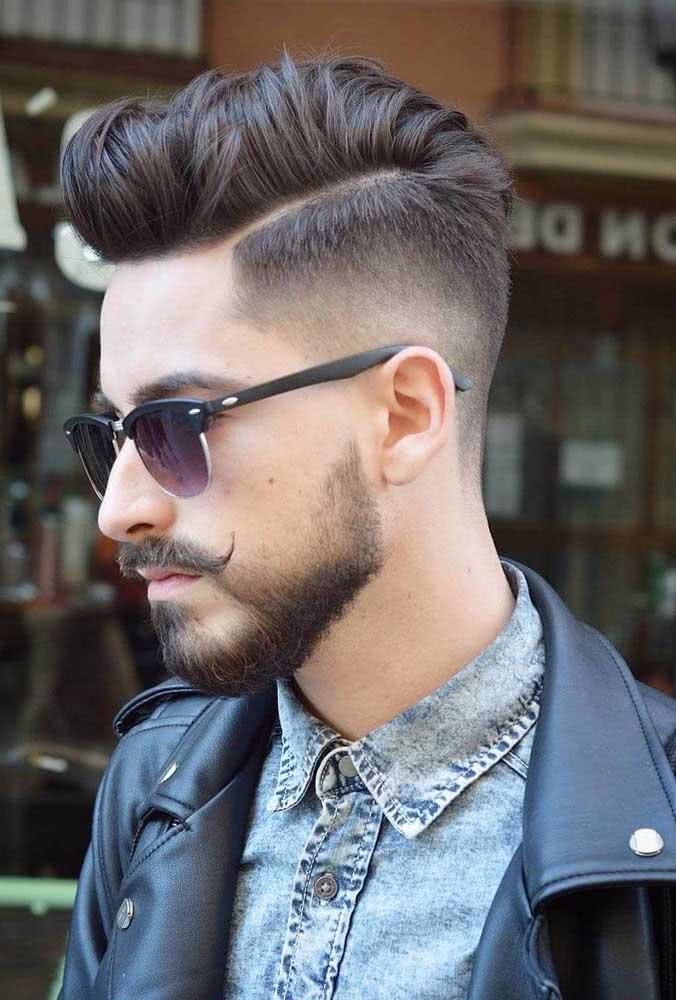 Já com a barba curta, o corte degradê é também uma ótima pedida para um visual de estilo. 